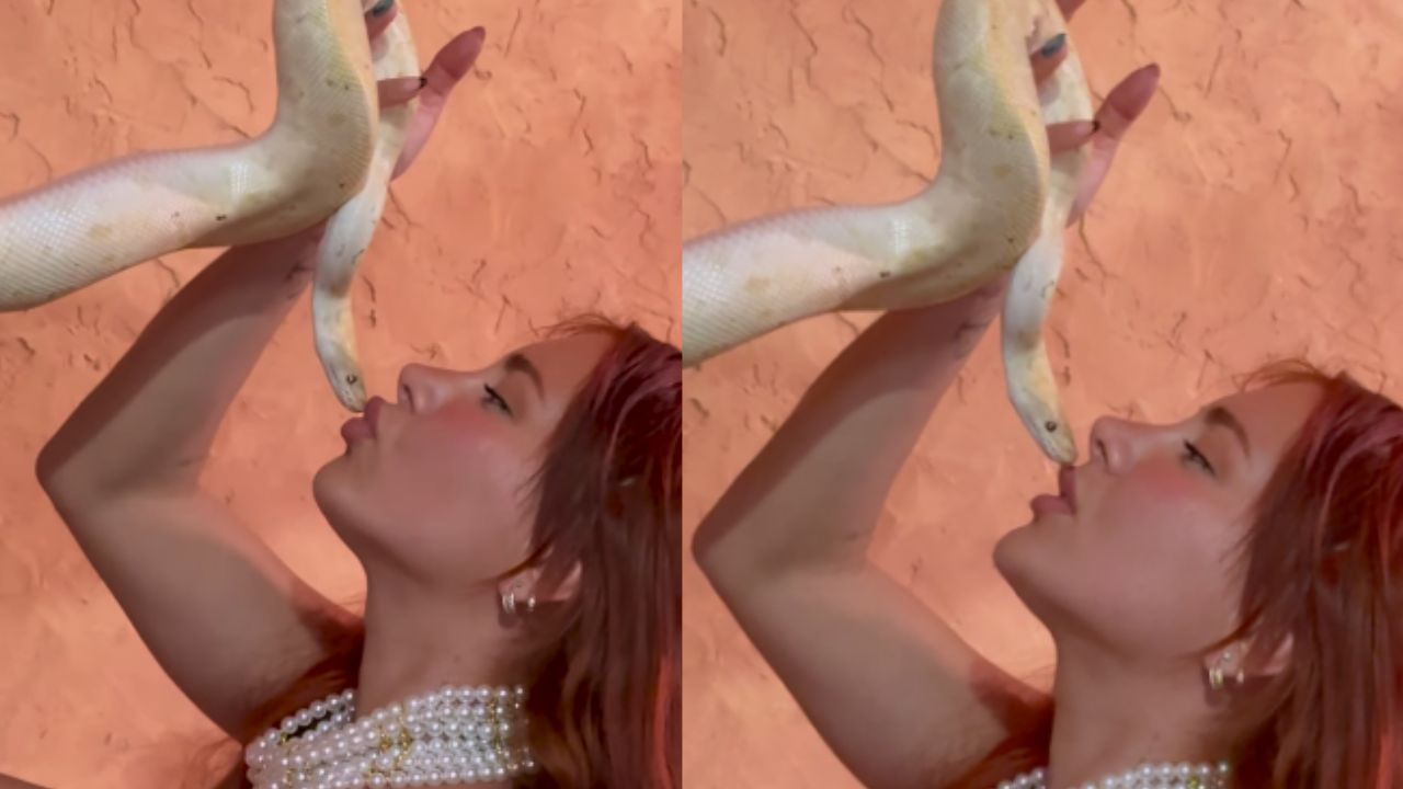 Model Kisses Alive Snake Video